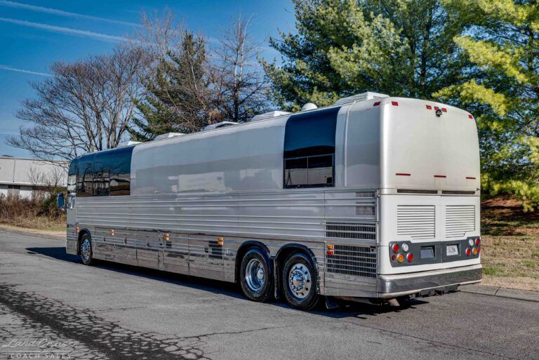 2001 Prevost XLII crew bus rear passenger-side exterior view Roberts Brothers conversion