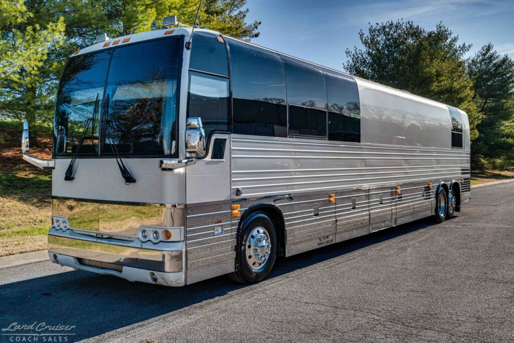 Prevost XLII Independence full side profile luxury crew bus with polished aluminum finish