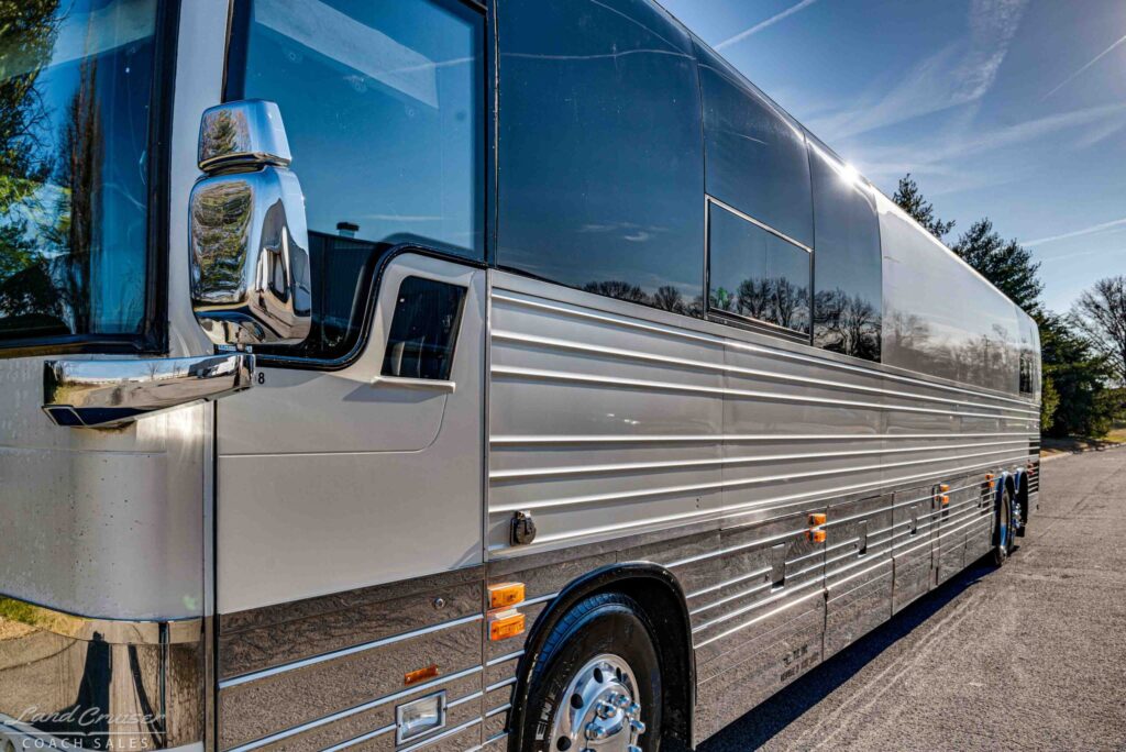 Prevost XLII stainless steel exterior side detail with mirror and body panels